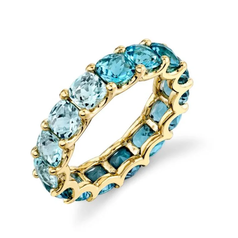 Classic men’s wedding rings -18K Yellow Gold Graduated Blue Topaz Eternity Band