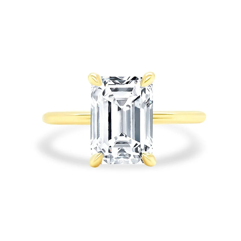 Affordable engagement rings under $1000 -Emerald Cut Solitaire