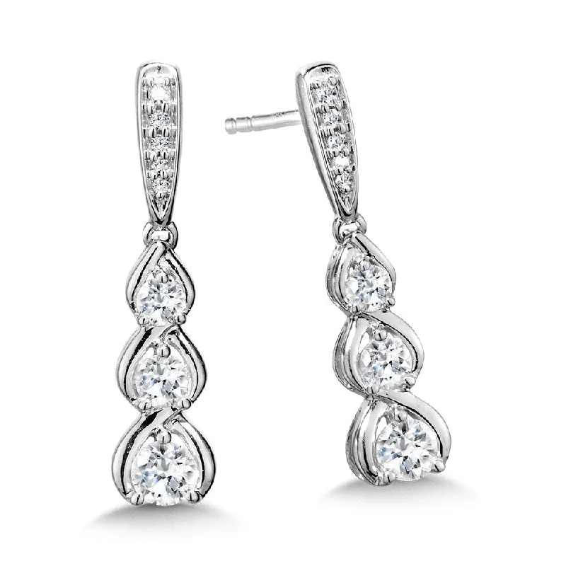 Chandelier earrings with pearls-Graduating Diamond Drop Earrings in White Gold