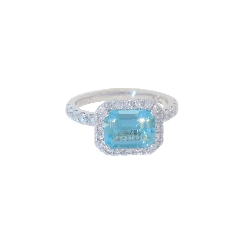 Elegant rings for luxury gift ideas -East-West Aquamarine and Diamond Halo Ring